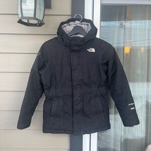 The North Face black kids' parka jacket